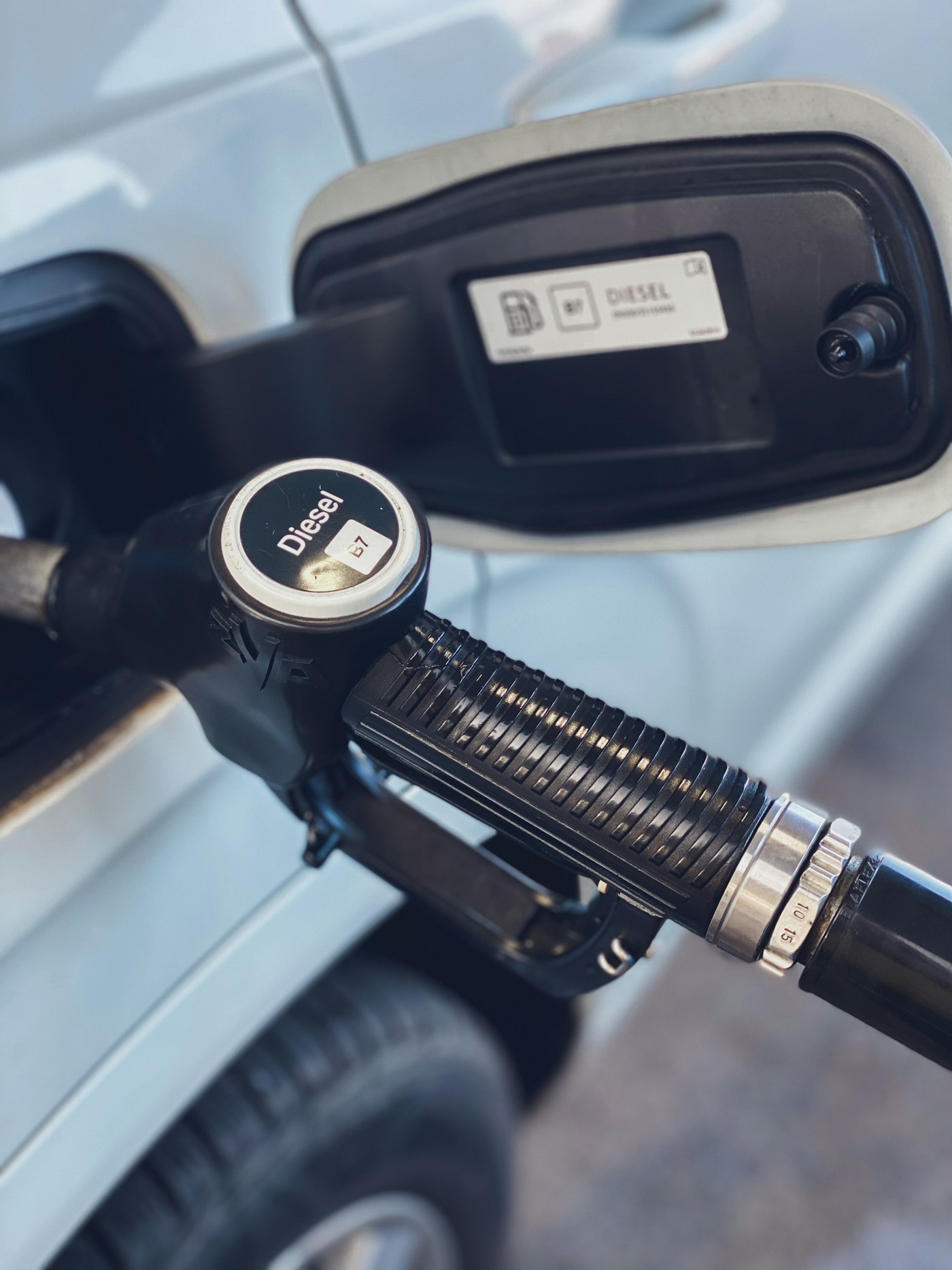 Fuel pump nozzles at a filling station